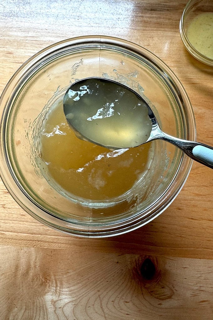 Gelatinous homemade chicken stock.