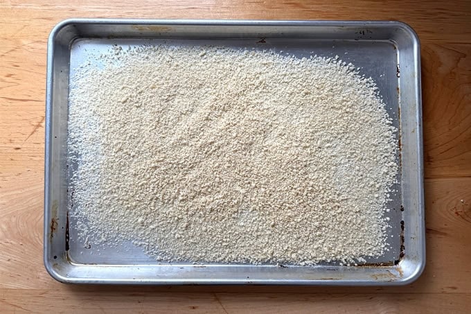 A sheet pan spread with panko bread crumbs.