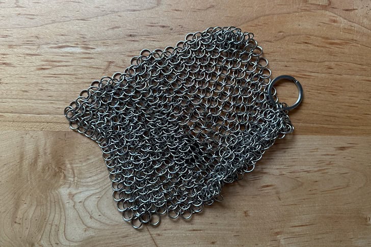 A chainmail cast iron skillet scrubber.