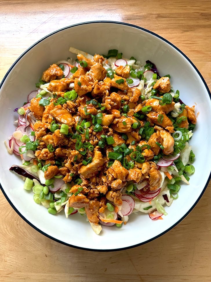 A large bowl holding Gochujang Chicken and Rice, a Hello Fresh meal.