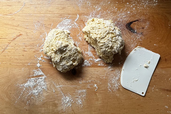 Croissant dough divided into two equal portions.